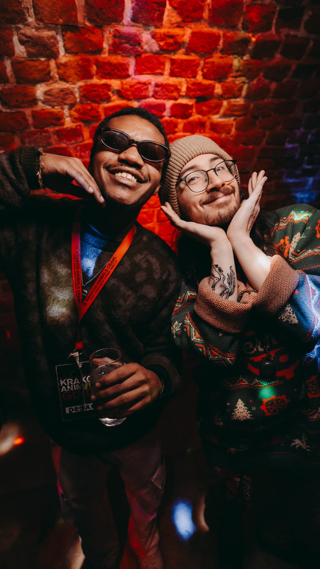 Smiling guests posing at a Krakow nightlife venue