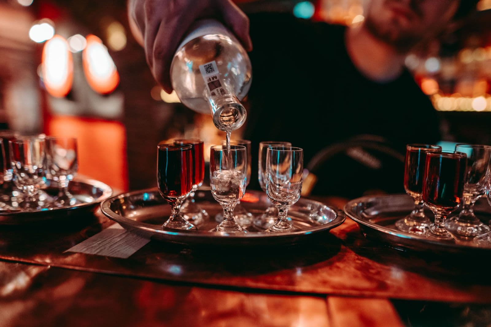 Drinks being poured during the 7:30 PM Tipsy Bar Tour